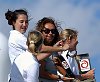 America's Cup 2003: A huge spectator fleet farewells Team New Zealand and Alinghi Swiss Challenge as they head to the racecourse on the first day of competition.