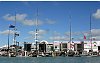 America's Cup 2003: A huge spectator fleet farewells Team New Zealand and Alinghi Swiss Challenge as they head to the racecourse on the first day of competition.