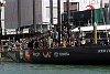 America's Cup 2003: A huge spectator fleet farewells Team New Zealand and Alinghi Swiss Challenge as they head to the racecourse on the first day of competition.