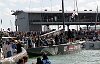 America's Cup 2003: A huge spectator fleet farewells Team New Zealand and Alinghi Swiss Challenge as they head to the racecourse on the first day of competition.