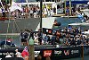 America's Cup 2003: A huge spectator fleet farewells Team New Zealand and Alinghi Swiss Challenge as they head to the racecourse on the first day of competition.