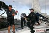 Triumphant crew on Emirates Team New Zealand celebrate their win with champagne.