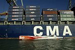 Ellen Macarthur and Trimaran B&Q � Asia Tour 2006 � Loading of B&Q onto the CMA-CGM container ship BIZET<br>Southampton (uk), the 9th of february 2006