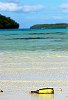 The Kingdom Of Tonga in the South Pacfic <br>A message in a bottle sits undisturbed on a deserted island