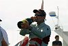 Alinghi wins the Louis Vuitton Cup let the celebrations begin<br><br>Alinghi skipper Russell Coutts celebrates their win by downing the obligatory Moet et Chandon.