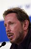Alinghi wins the Louis Vuitton Cup let the celebrations begin<br><br>Disappointed Oracle BMW Racing syndicate head Larry Ellison congratulates the Alinghi crew at the press conference.