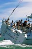 Owen/Clarke high performance 65 footer preforms sea trials in the Waitemata Harbour on a hot January day.<br>Auckland - New Zealand<br>Merfyn Owen at the helm