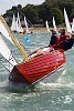 The 180th Skandia Cowes Week Regatta got underway today amidst changing conditions as an occluded front swept eastwards across the British Isles testing the record fleet of 1,028 yachts across some 37 classes. <br>Little wooden Folk boat in Class 9 ISC<br><br>�Paul Todd/outsideimages.co.nz<br><br>*******Editorial Use Only********<br><br>