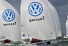 The 180th Skandia Cowes Week,Day four of Skandia Cowes Week 2006 dawned with a forecast of strong and blustery south-westerly winds with gusts straining the dial beneath storm clouds producing a lumpy Solent and gusts of up to 29 knots<br>Laser SB3 fleet<br>�Paul Todd/outsideimages.co.nz<br><br>*******Editorial Use Only********<br>